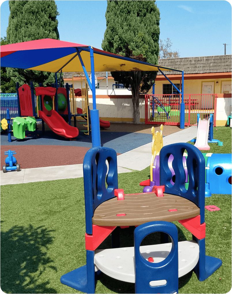 A colorful playground area where preschoolers and kindergarteners can play outside.